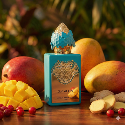 Frasco dorado y ámbar del perfume God of Fire de Stéphane Humbert Lucas 777 con emblema de serpiente.